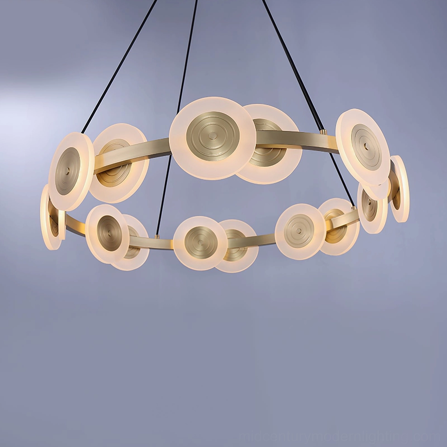 Samiya brass chandelier three-quarter side view with circular disc accents, luxury design detail