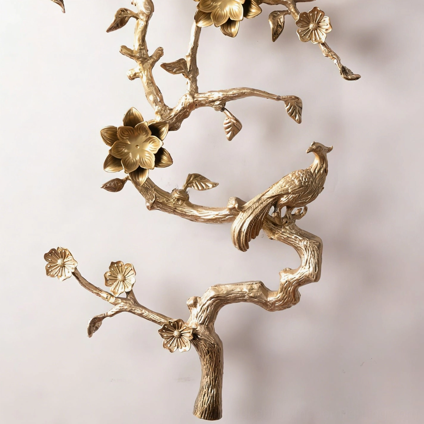 Sanremo wall sconce decorative base close-up showing oriental-inspired textured brass finish and artisanal craftsmanship