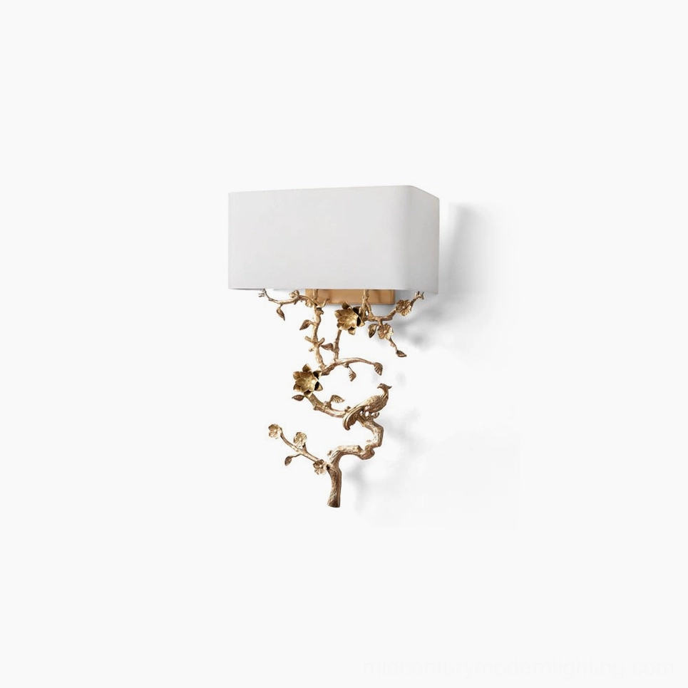 Sanremo brass wall sconce with sculptural branch design and white fabric shade, frontal studio view showing hand-crafted metal frame details