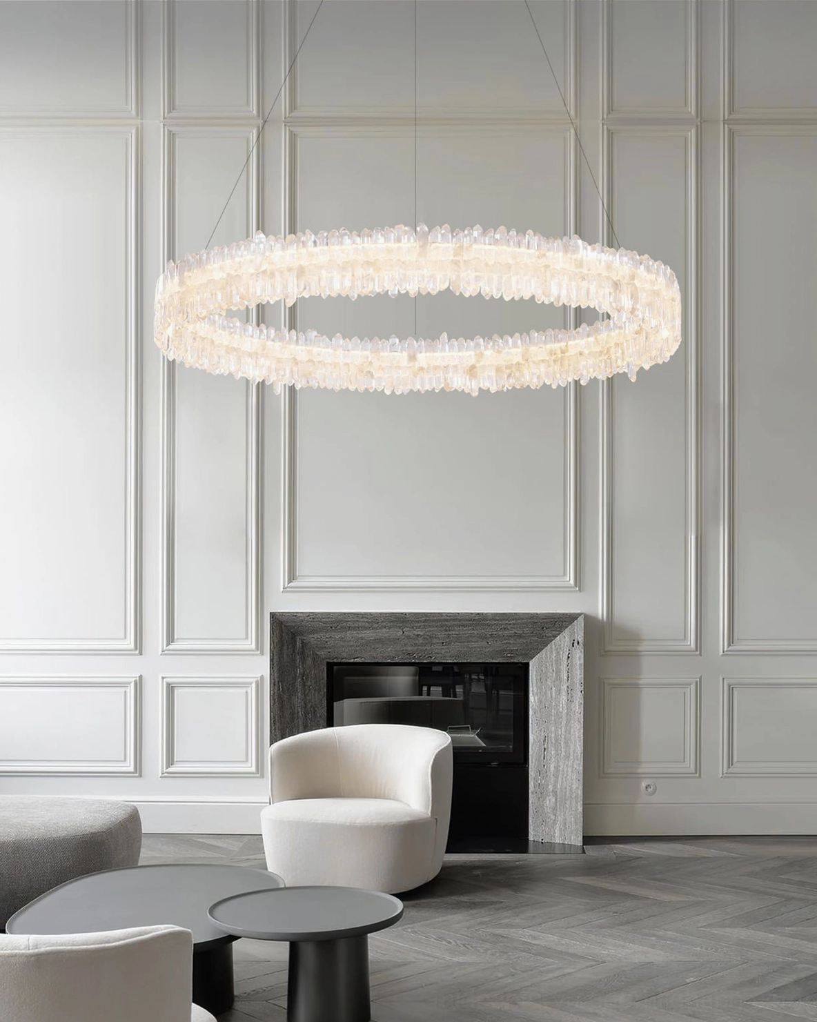 Sarella pendant chandelier in minimalist monochrome living room with fireplace and paneled wall luxury styling