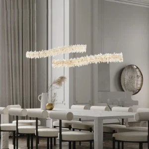 Sarella Square Chandelier installed in modern dining room with warm LED crystal lighting over dining table