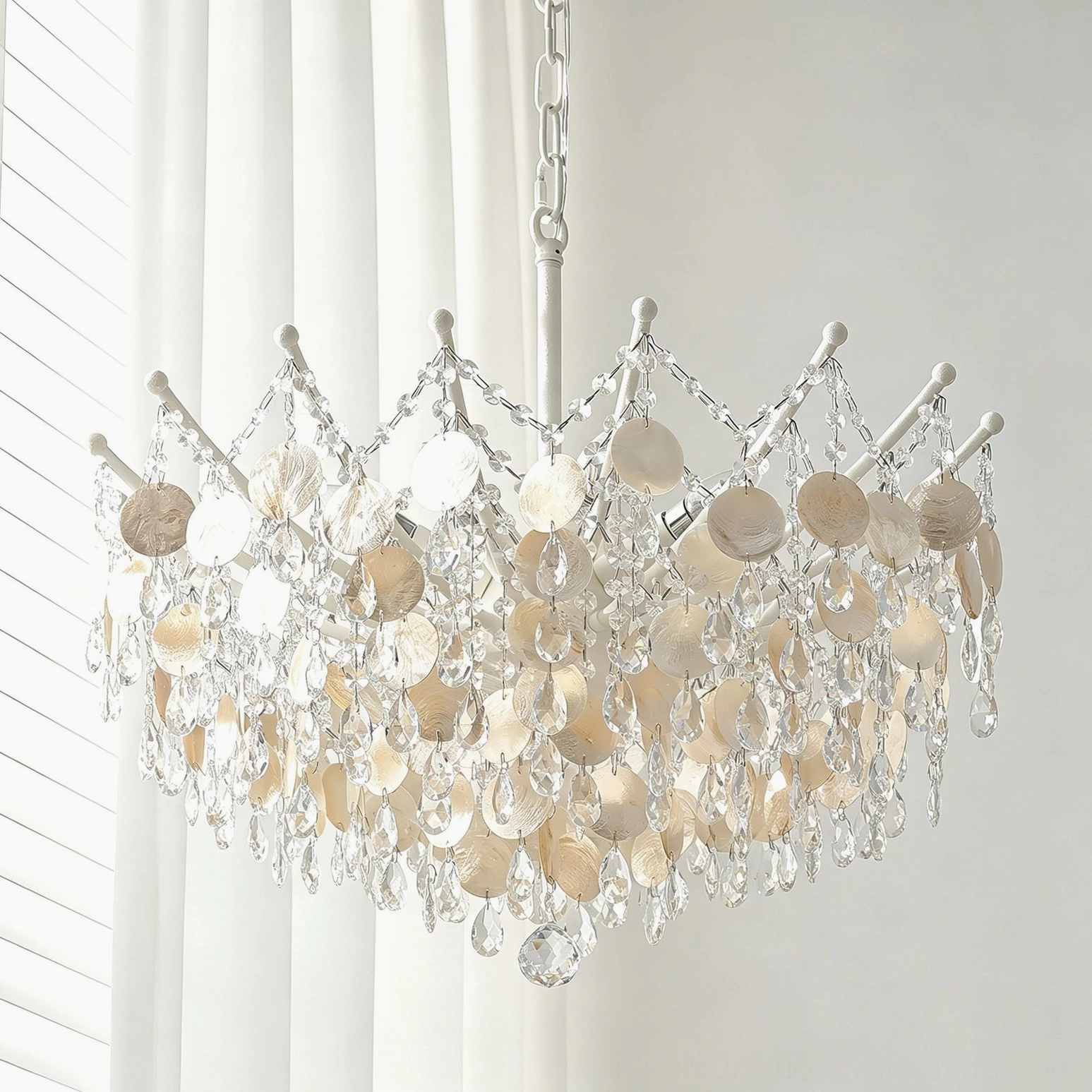 Sasha Capiz Bead Chandelier detail showing crystal bead suspension and capiz shell luminosity with diffused light