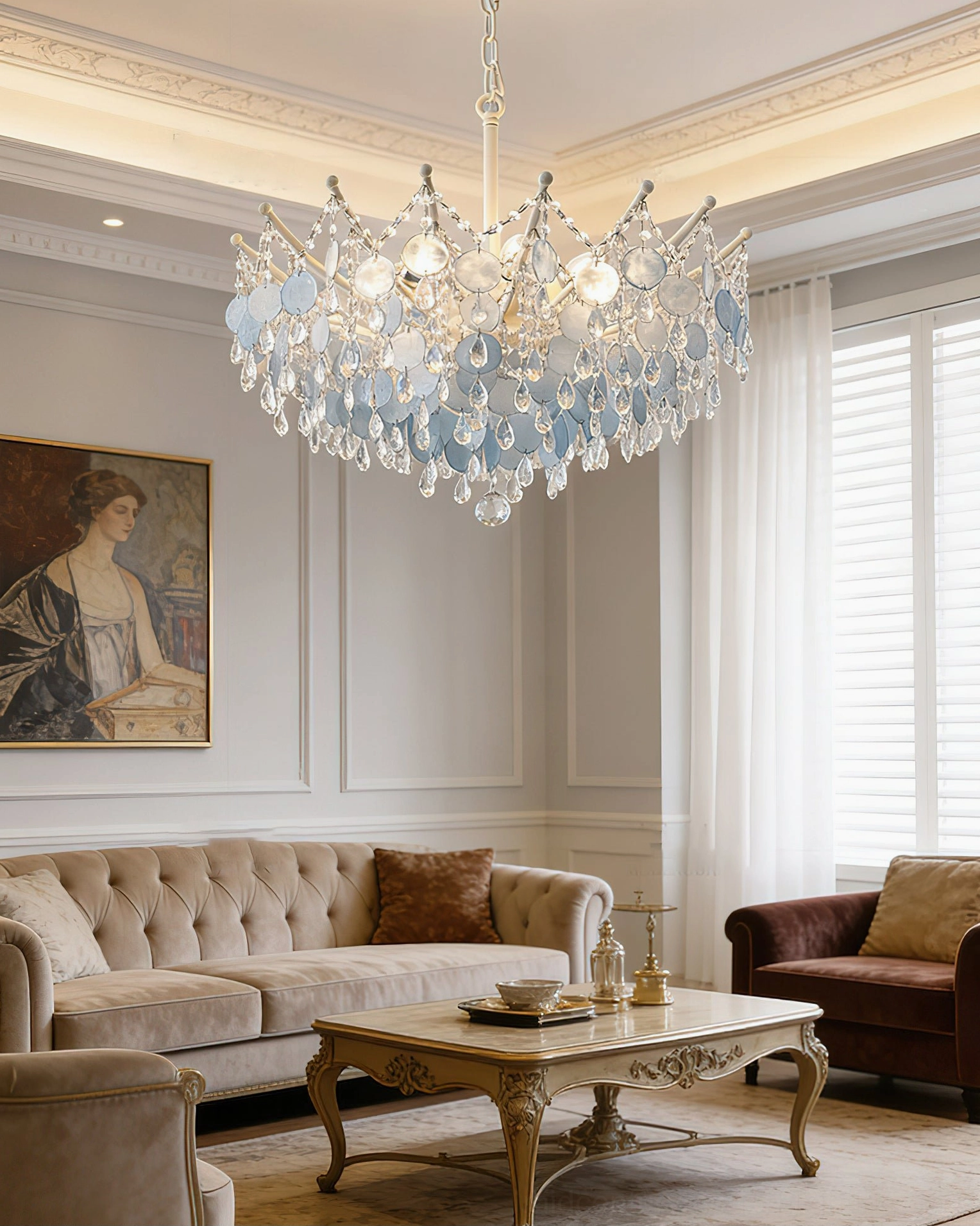 Sasha Capiz Bead Chandelier installed in luxury French neoclassical living room above tufted sofa, soft lighting ambiance