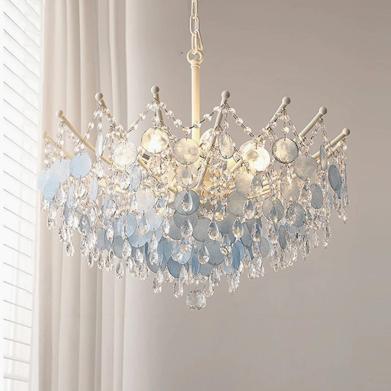 Large Sasha Capiz Bead Chandelier in blue shell with white frame, close-up view of tiered disc suspension and crystal details