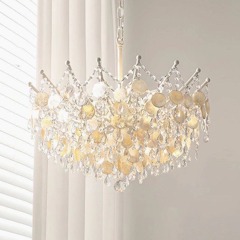 Medium Sasha Capiz Bead Chandelier in soft gold, angled overhead perspective, bedroom-scale pendant light
