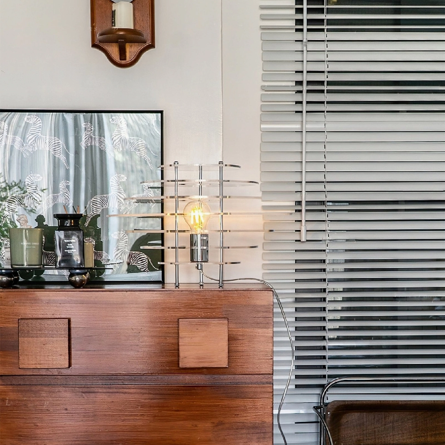 Saturn table lamp eye-level side view on vintage wooden dresser - mid-century modern home accent lighting