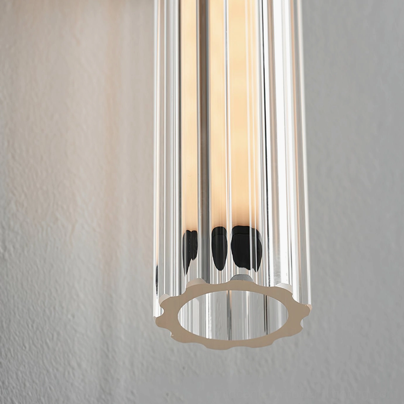 Macro detail of Saxon wall lamp ribbed glass shade and LED construction