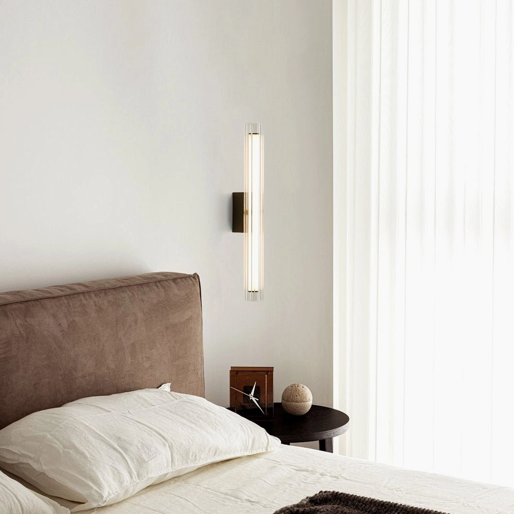 Saxon wall lamp installed in minimalist modern bedroom bedside setting