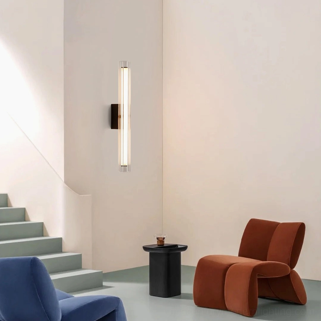 Saxon modern sconce in contemporary stairwell with accent armchairs