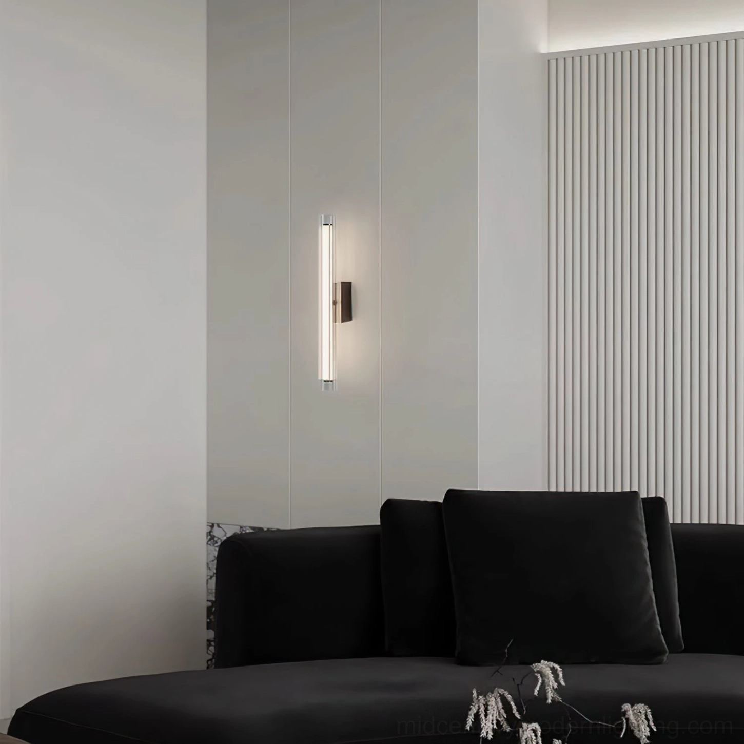 Saxon vertical wall lamp on modern living room accent wall