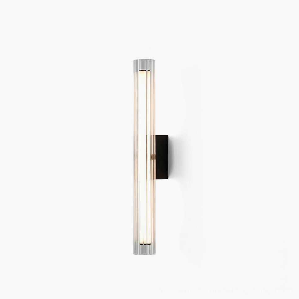Saxon modern wall lamp with ribbed glass shade in front studio view