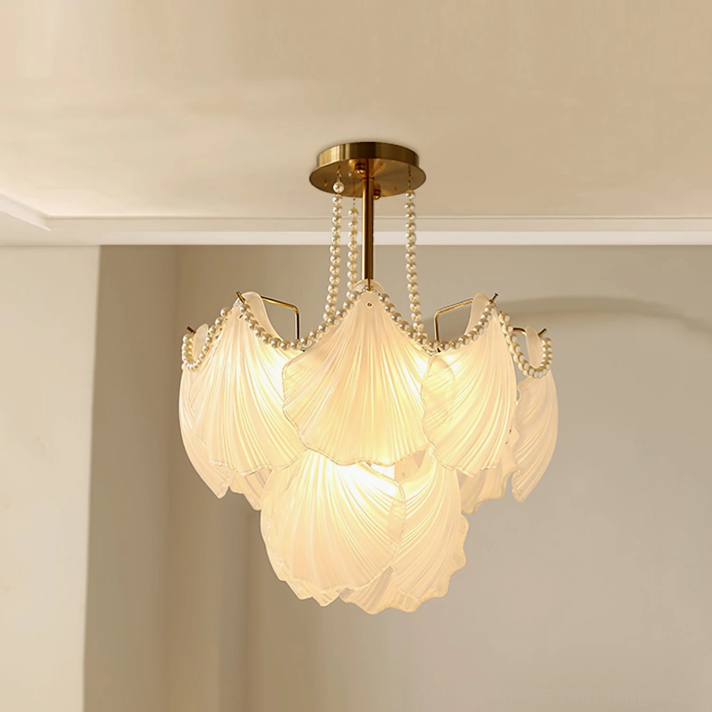 Scallop shell glass pendant chandelier with cascading frosted shades and warm brass metallic base