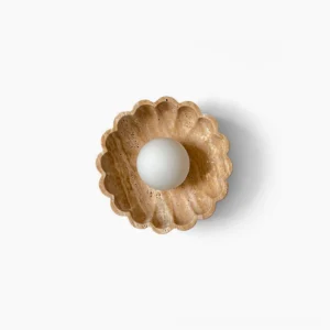 Scallop wall lamp with frosted glass globe and natural travertine base, overhead flat lay on white background