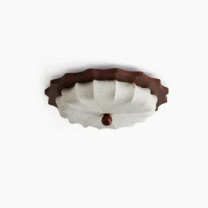 Scalloped flush mount ceiling light with walnut wood frame and patterned fabric shade, studio product shot on white background
