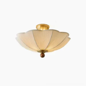 Scalloped pleated semi-flush ceiling light with brushed brass hardware and off-white fabric shade, direct overhead view on white background
