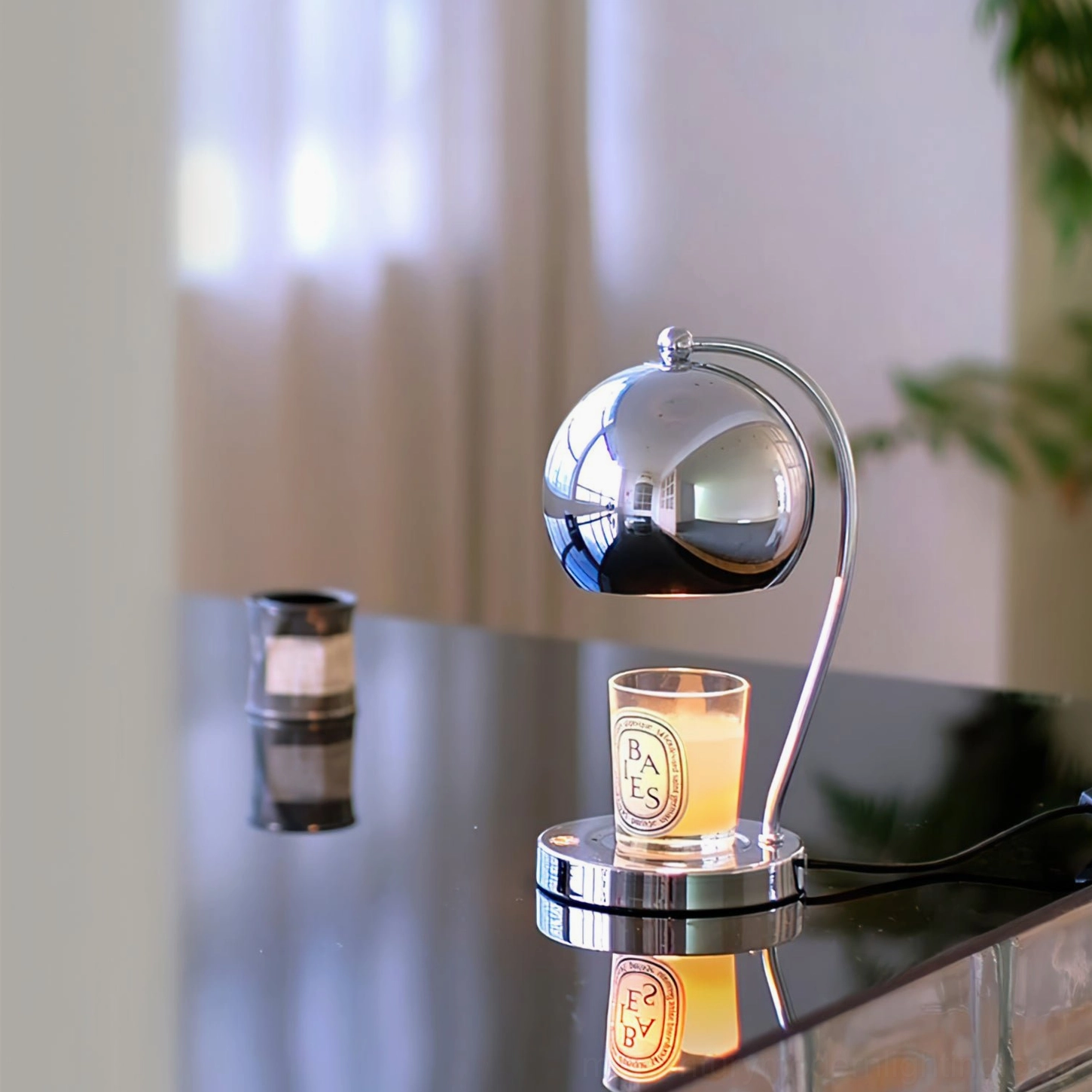 Off-white candle warmer lamp glowing warm light ambiance evening atmosphere