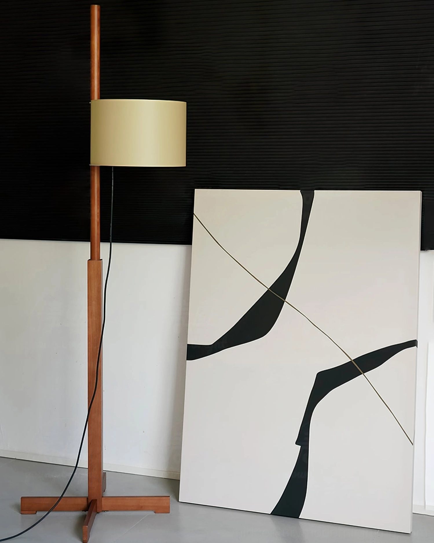 Wooden floor lamp in minimalist Scandinavian interior with neutral décor palette