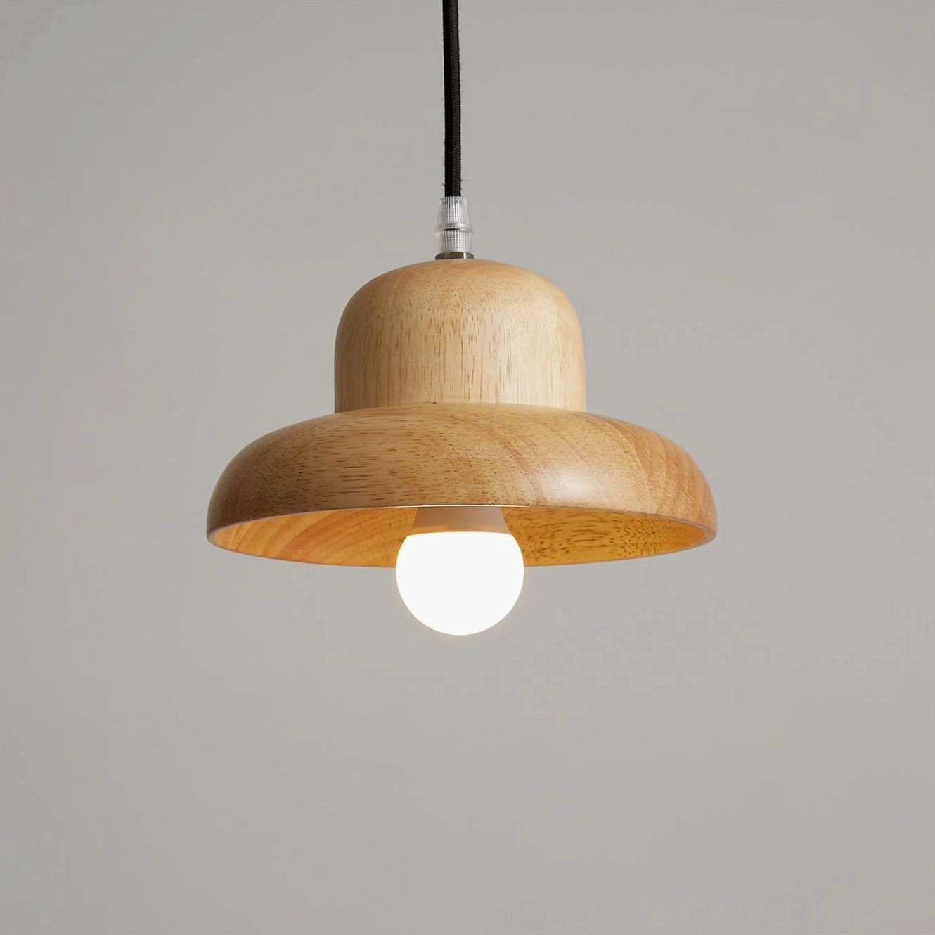 Wooden pendant light in Scandinavian interior setting with neutral tones and organic design elements