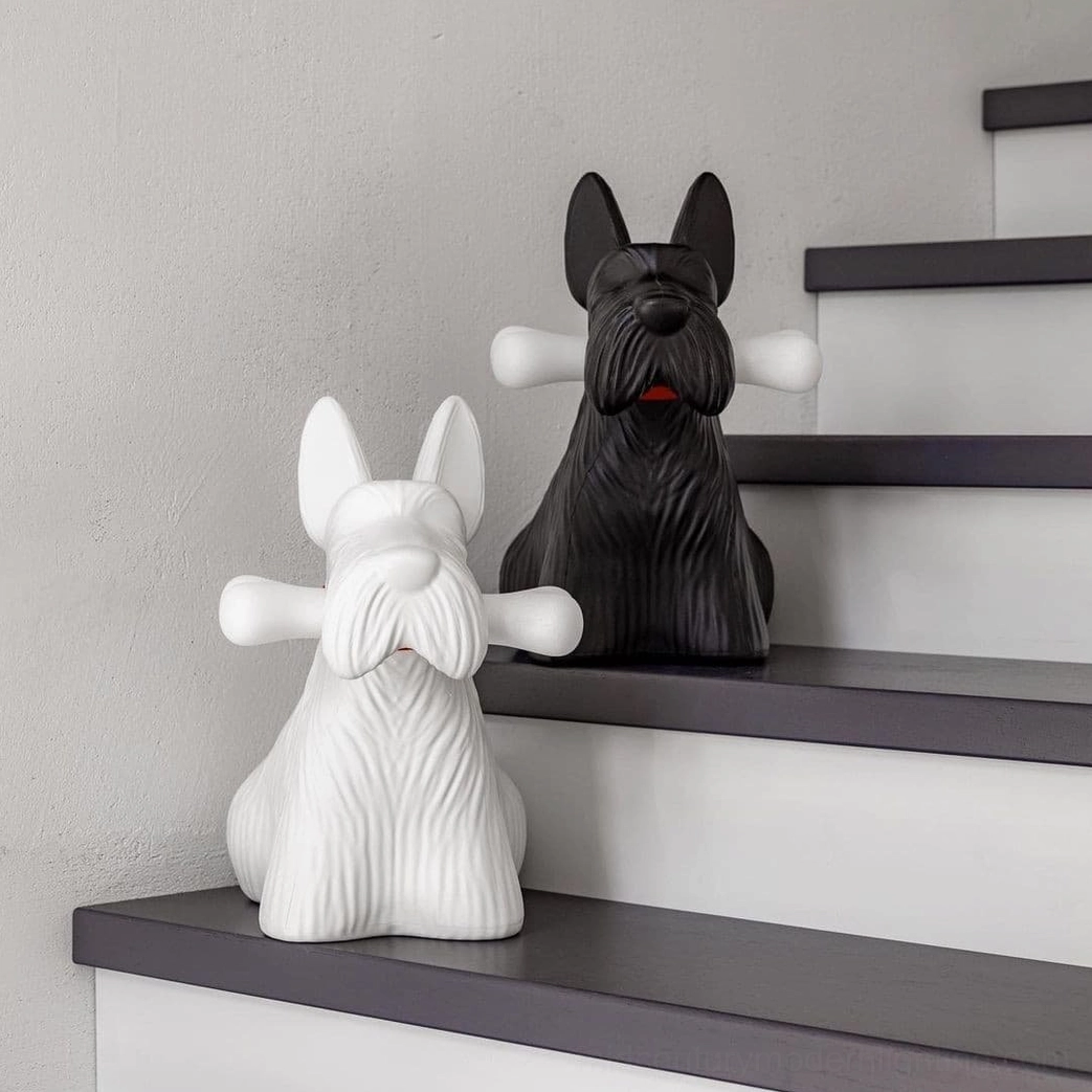 White Scottie dog lamp on bedside table ambient lighting contemporary interior