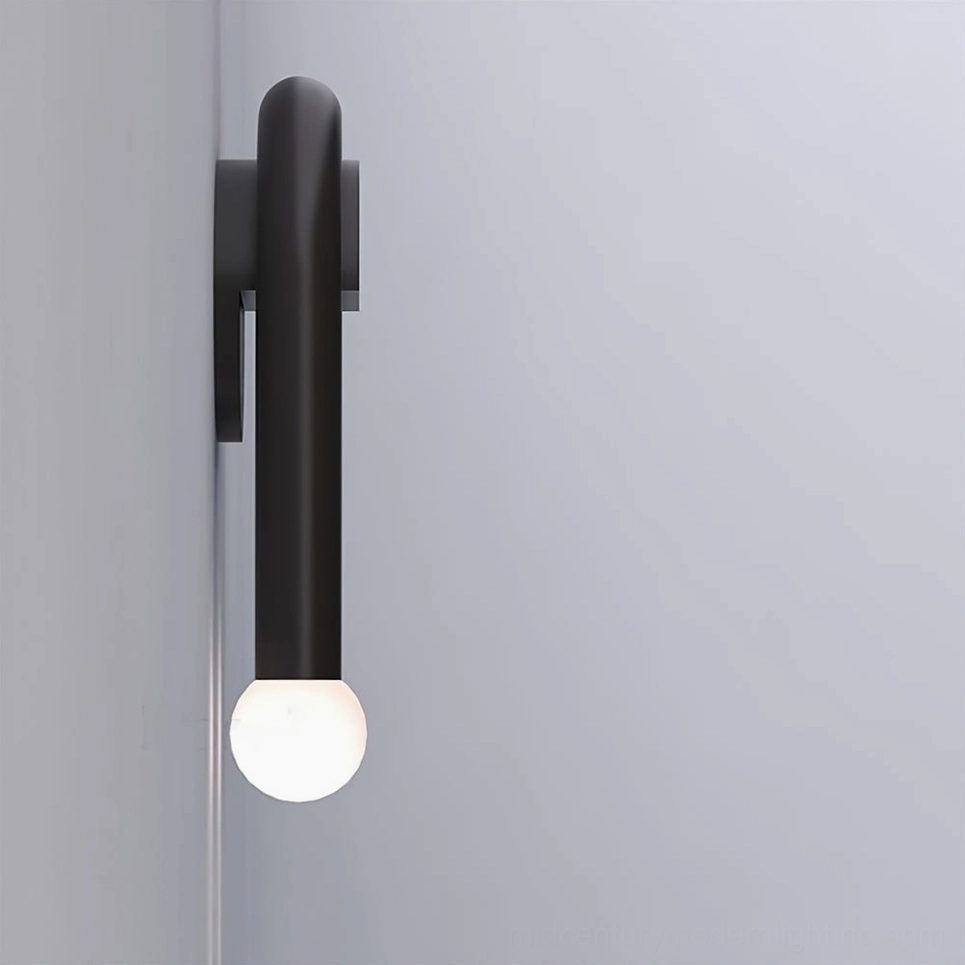 Sculptural double arched wall lamp showcasing mid-century modern design principles and architectural form