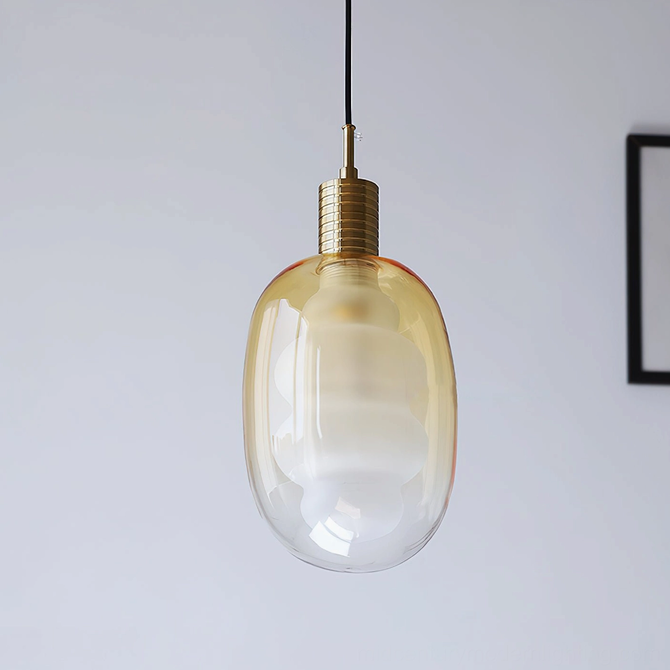 Sculptural pendant light installed view, ambient illumination, modern home interior setting