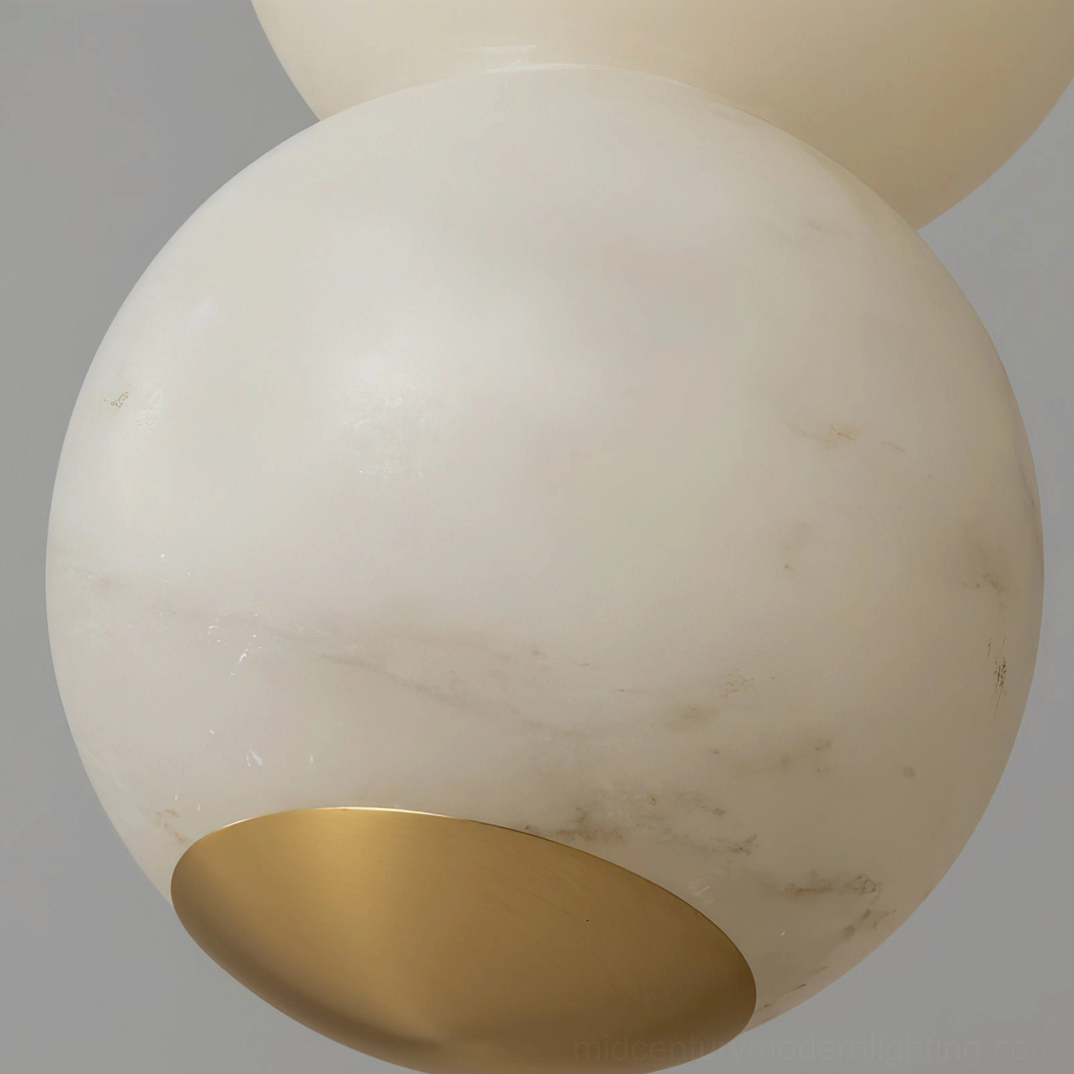Sculptural stacked stone sphere pendant light organic modern aesthetic detail view