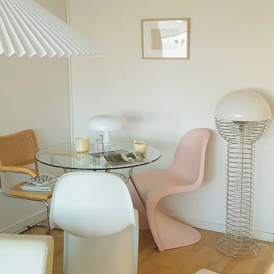 Sculptural wire floor lamp with open framework creating visual lightness in interior design