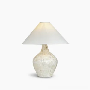 Seashell mosaic table lamp with creamy white fabric shade and handcrafted shell inlay base, studio lighting on white background