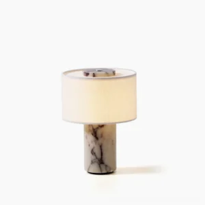 Sediment cordless marble table lamp with cylindrical natural stone base and white fabric drum shade, front view studio shot