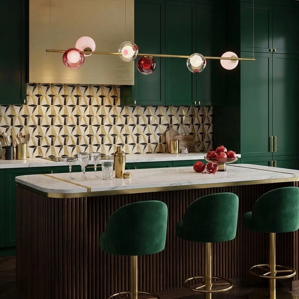 Luxury kitchen with Sedna linear pendant above island - dark green cabinetry, marble countertop, and bold retro aesthetic