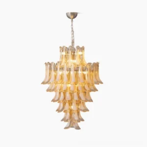 Sella Murano hand-blown glass chandelier with tiered amber glass petals and golden metal accents, studio view