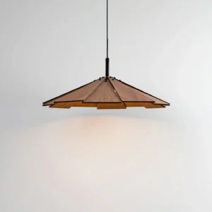Illuminated sepal pendant lamp hanging with warm ambient light casting soft glow in modern space