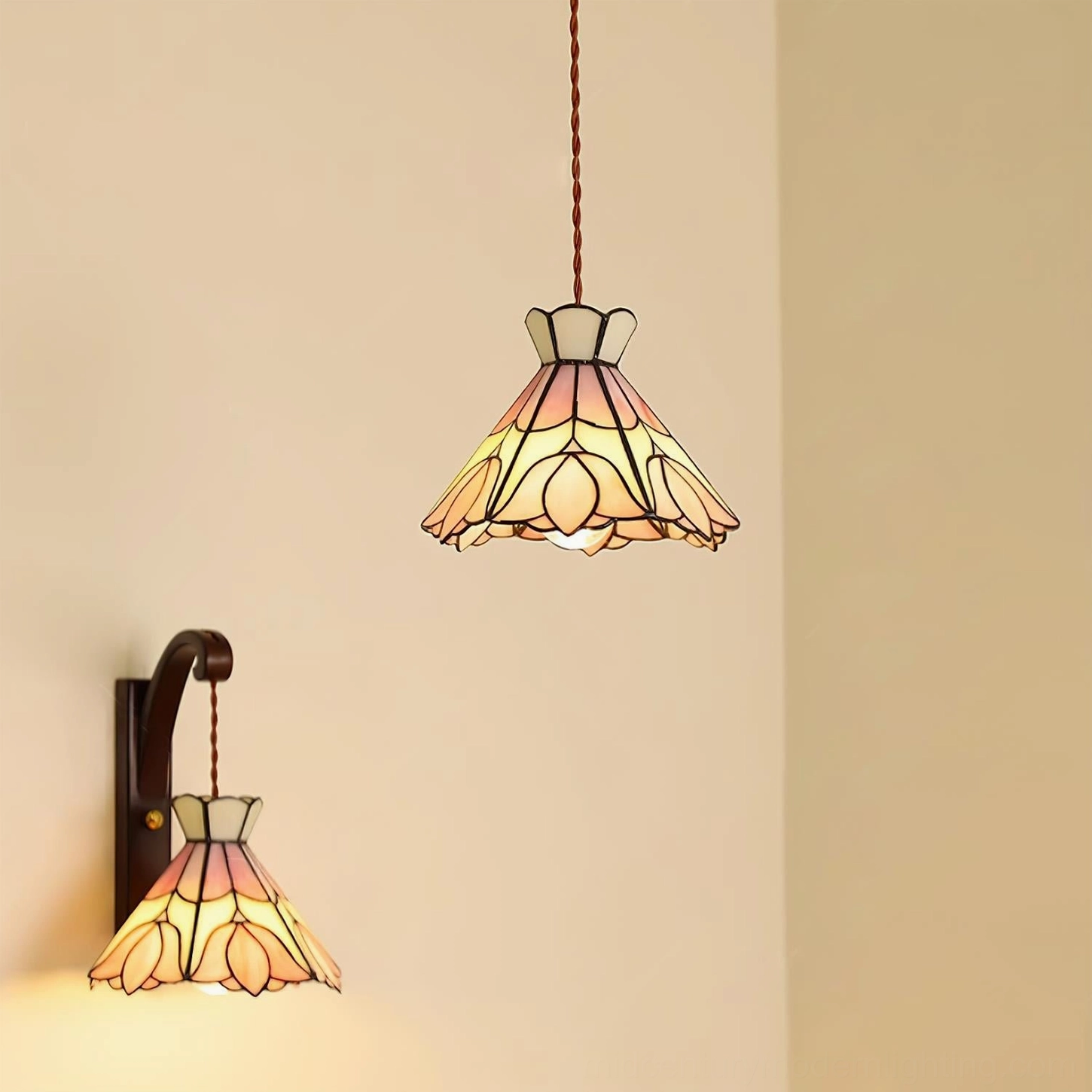Serena Tiffany tulip pendant lamp installed in interior space showing authentic pink stained glass and brass framing