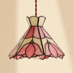 Close-up detail of Serena pendant lamp showing twisted fabric hanging cord and glass panel texture
