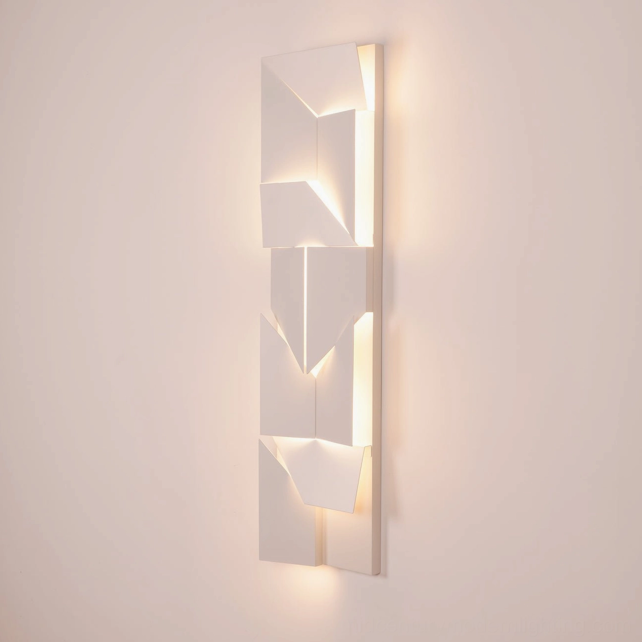 Modern architectural geometric wall sconce, laser-cut precision LED illumination