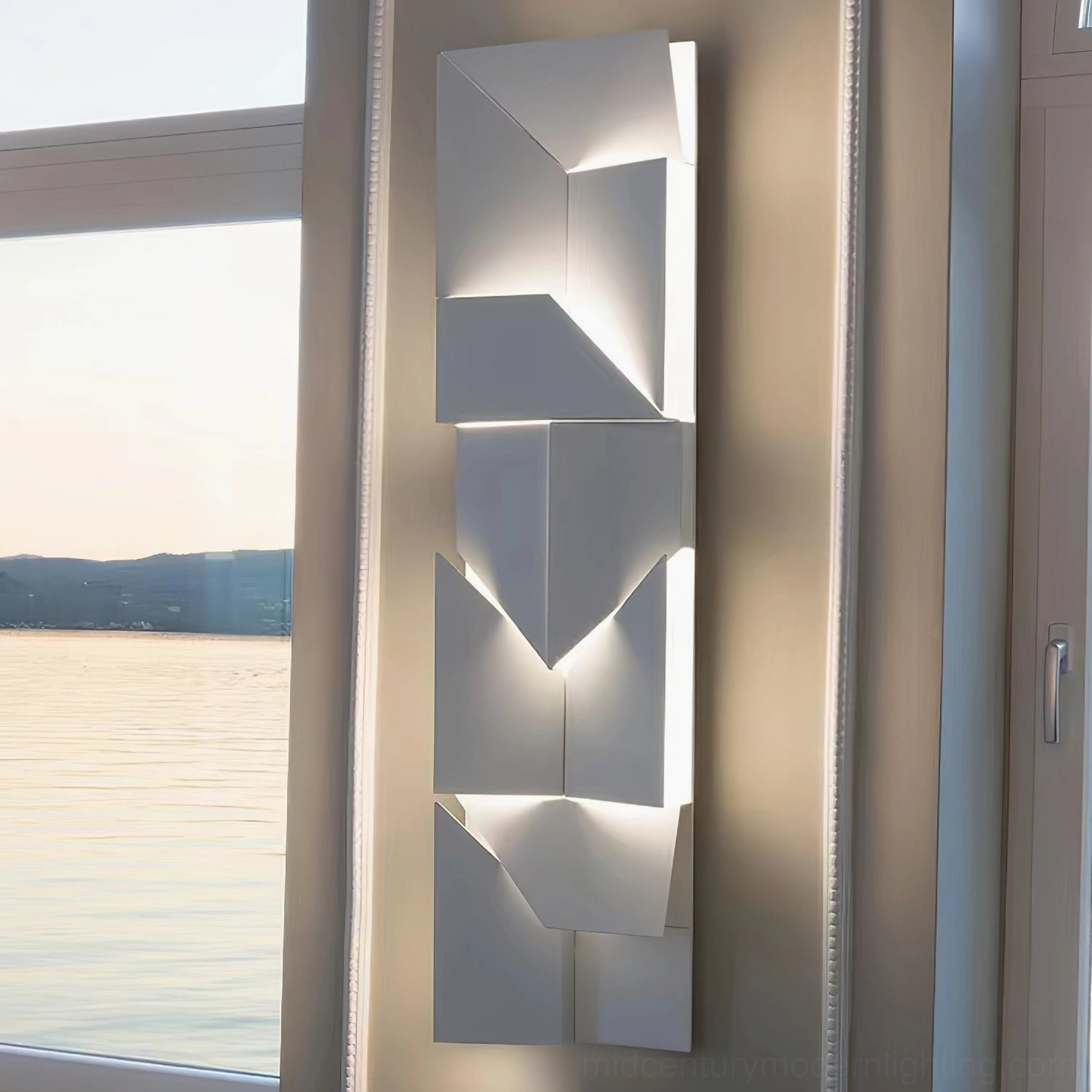 Contemporary wall-mounted geometric sconce with integrated LED, minimalist architectural design