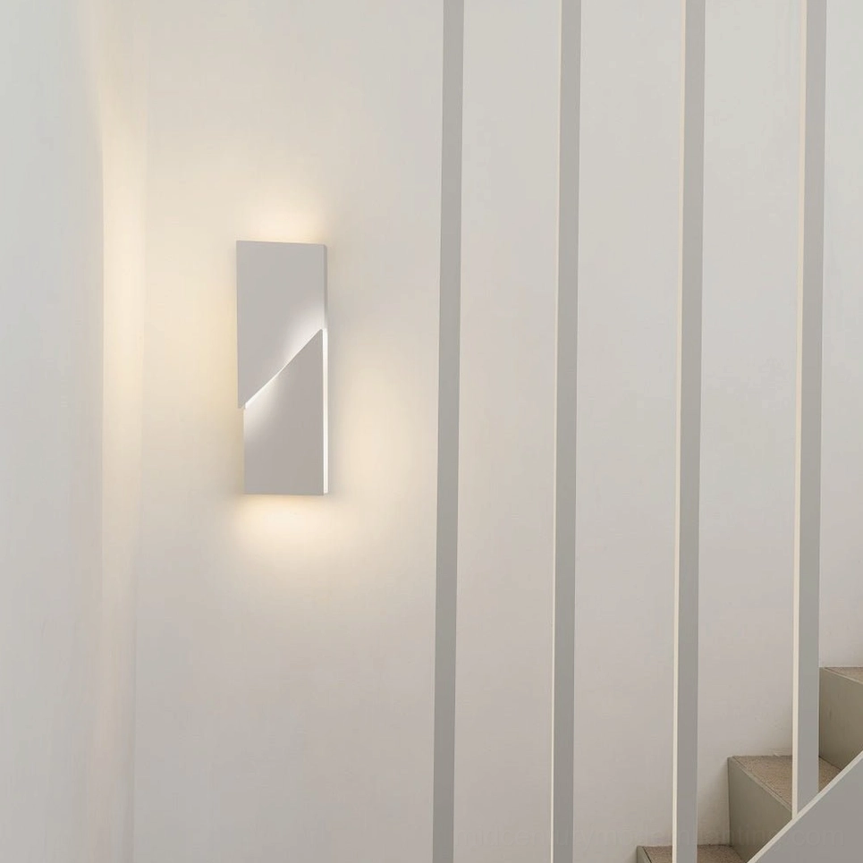 Contemporary geometric wall sconce, white matte finish, integrated LED warm light