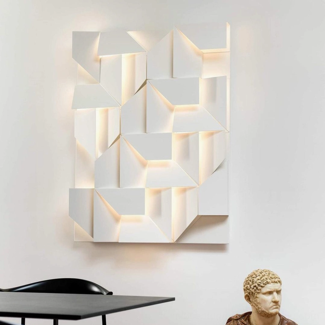 Modern wall lamp with geometric laser-cut pattern, LED backlit architecture design