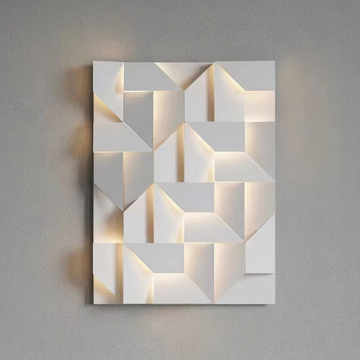 Geometric wall lamp mounted on textured gray wall with warm side backlighting and 3D shadow effect