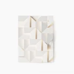 Shadows geometric wall sconce with laser-cut aluminum design, flat white finish, studio product view