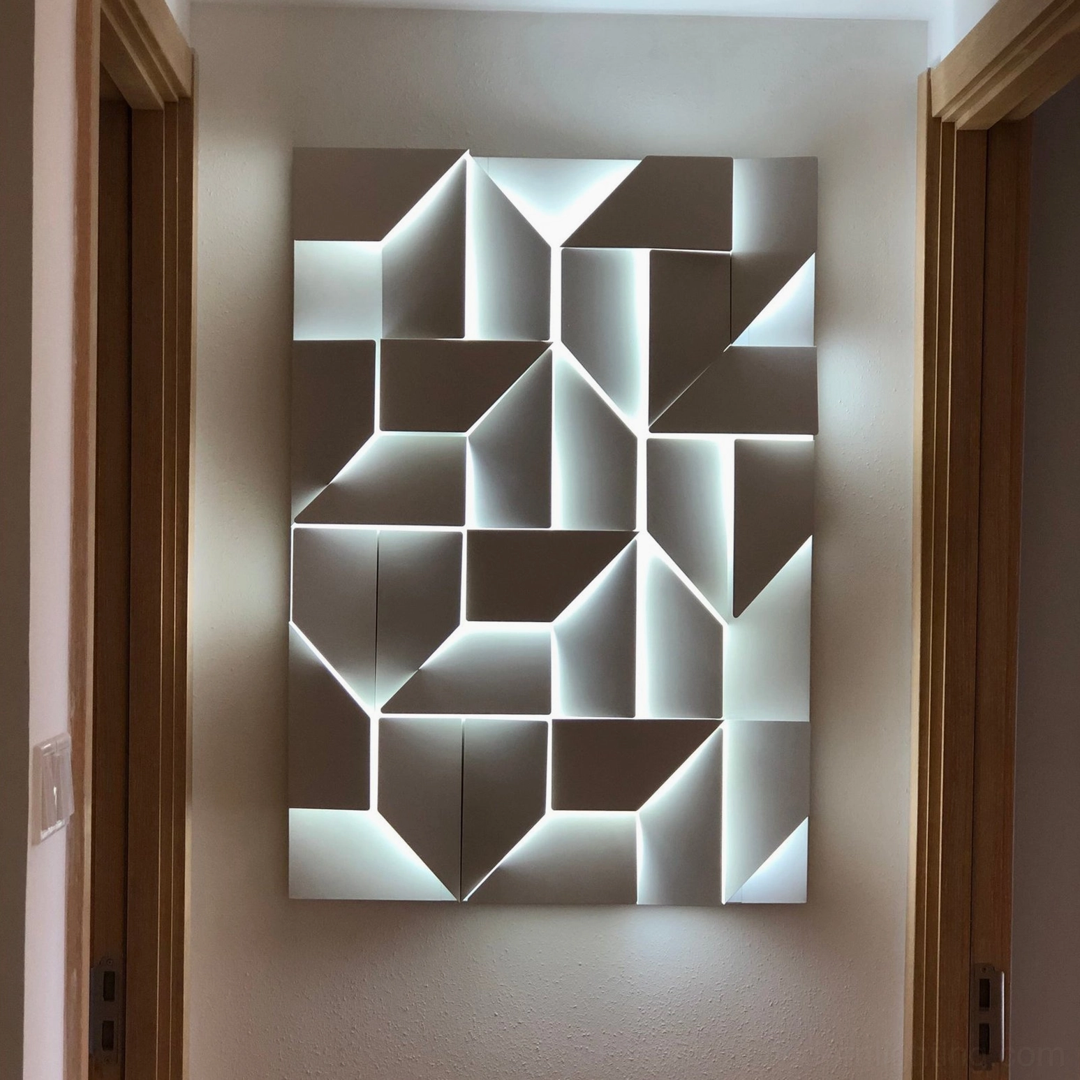 Wall-mounted geometric sconce LED backlit, minimalist abstract light design