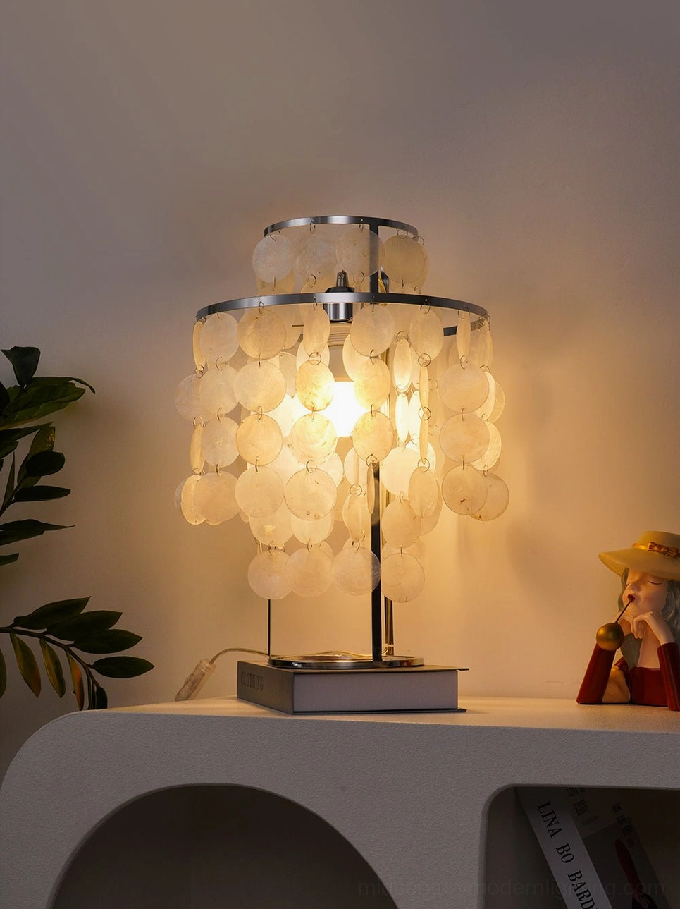 Capiz shell table lamp as focal point in contemporary home interior design