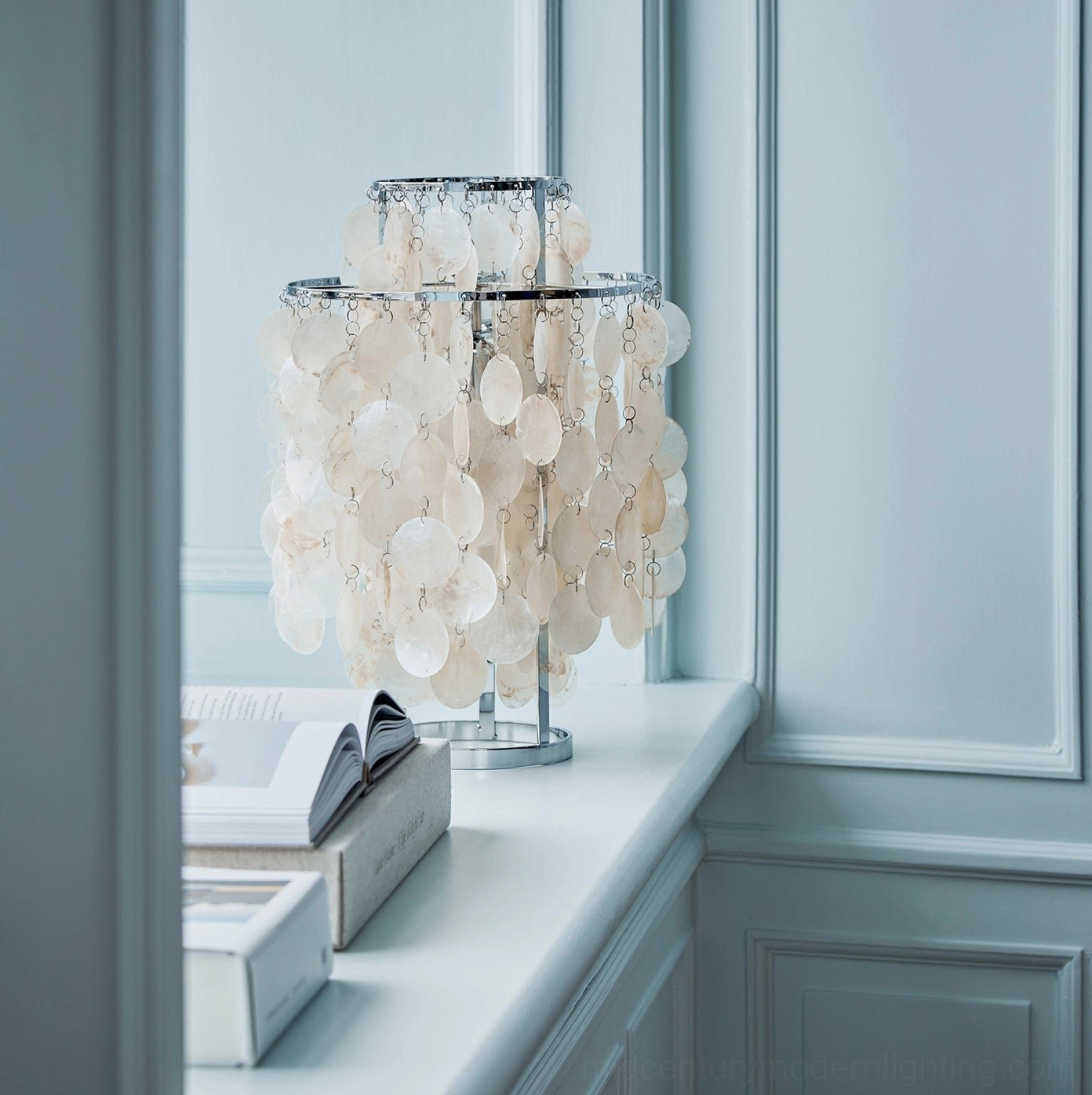 Contemporary mother-of-pearl shell table lamp in luxury home accent lighting role