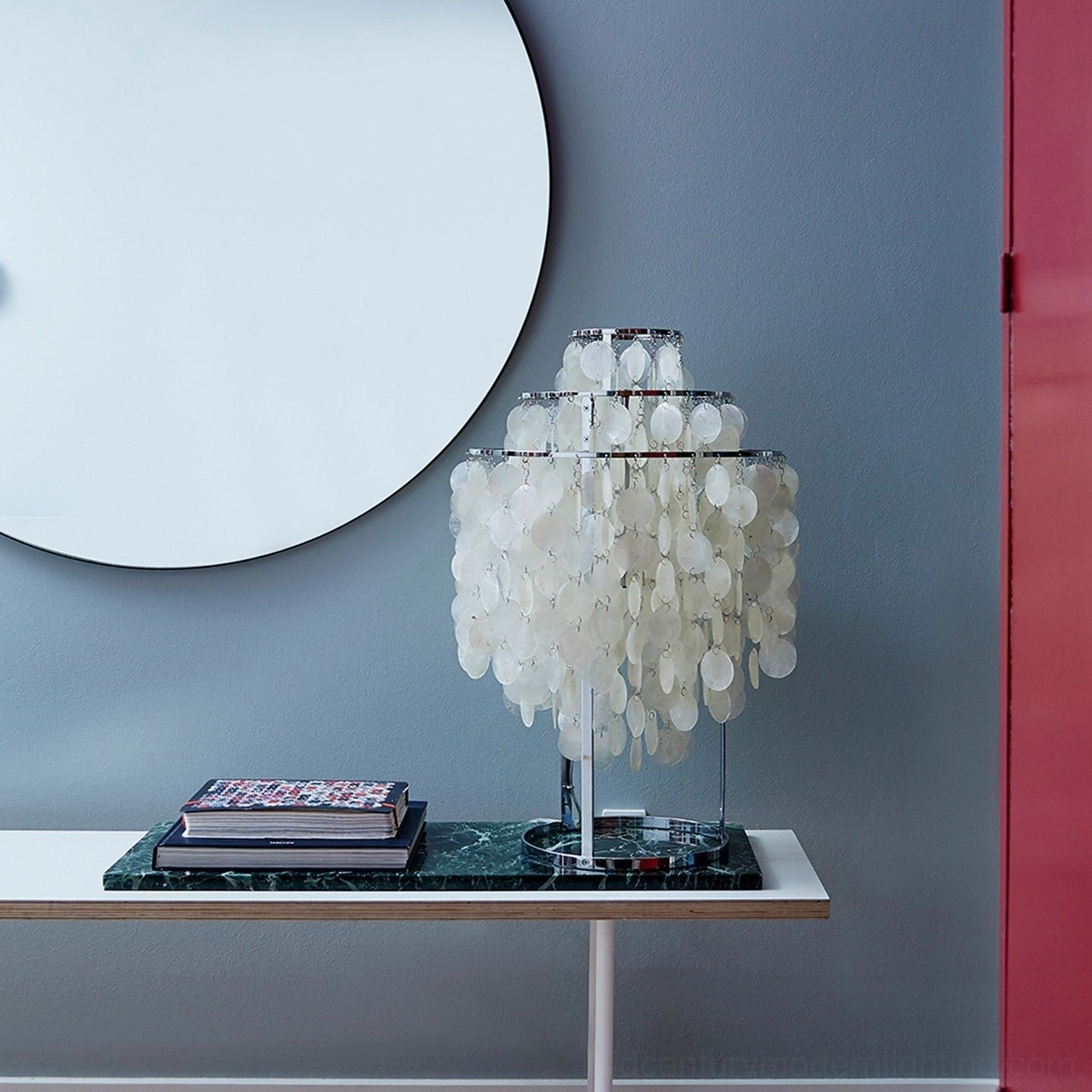 Mother-of-pearl shell table lamp showing translucent shell beauty in soft light