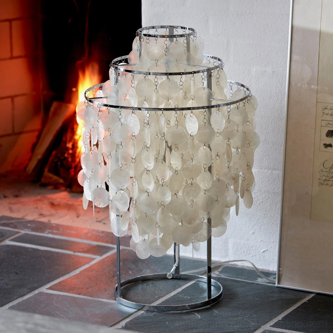 Modern shell table lamp creating warm ambiance in sophisticated home interior design