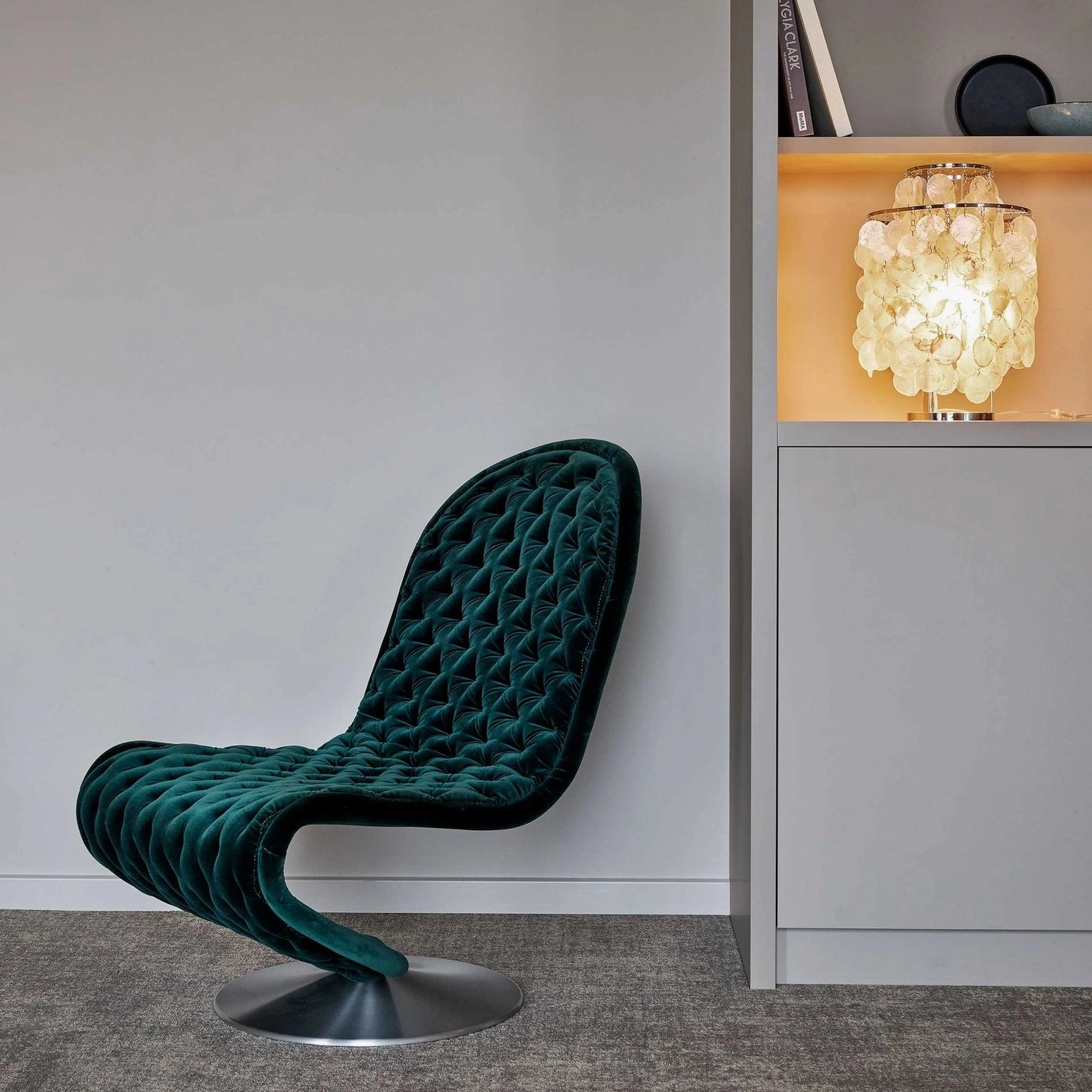 Luxury shell table lamp creating soft diffused light in modern home interior