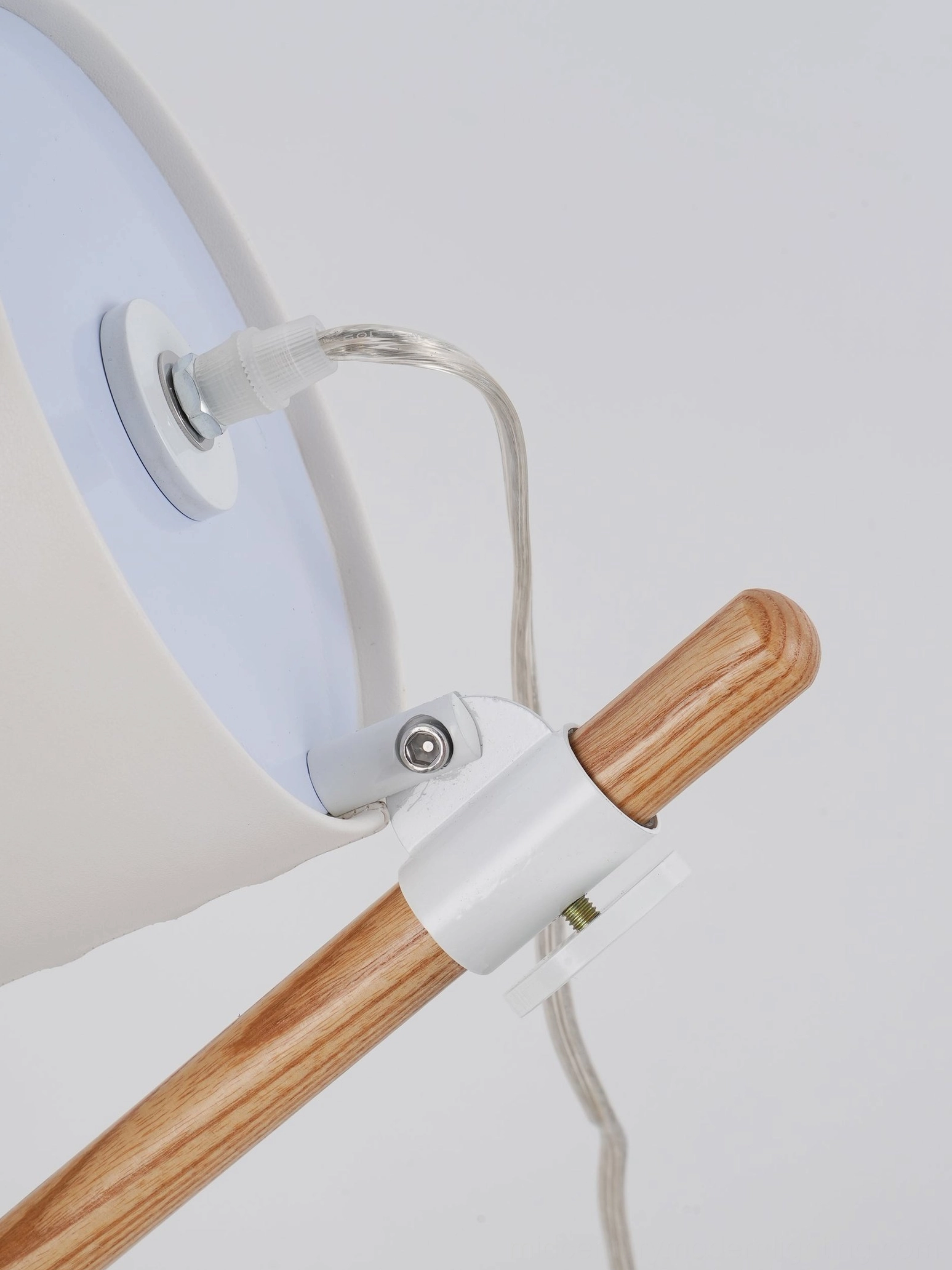 Shift mid-century modern tripod table lamp design detail showing wood tripod and connector