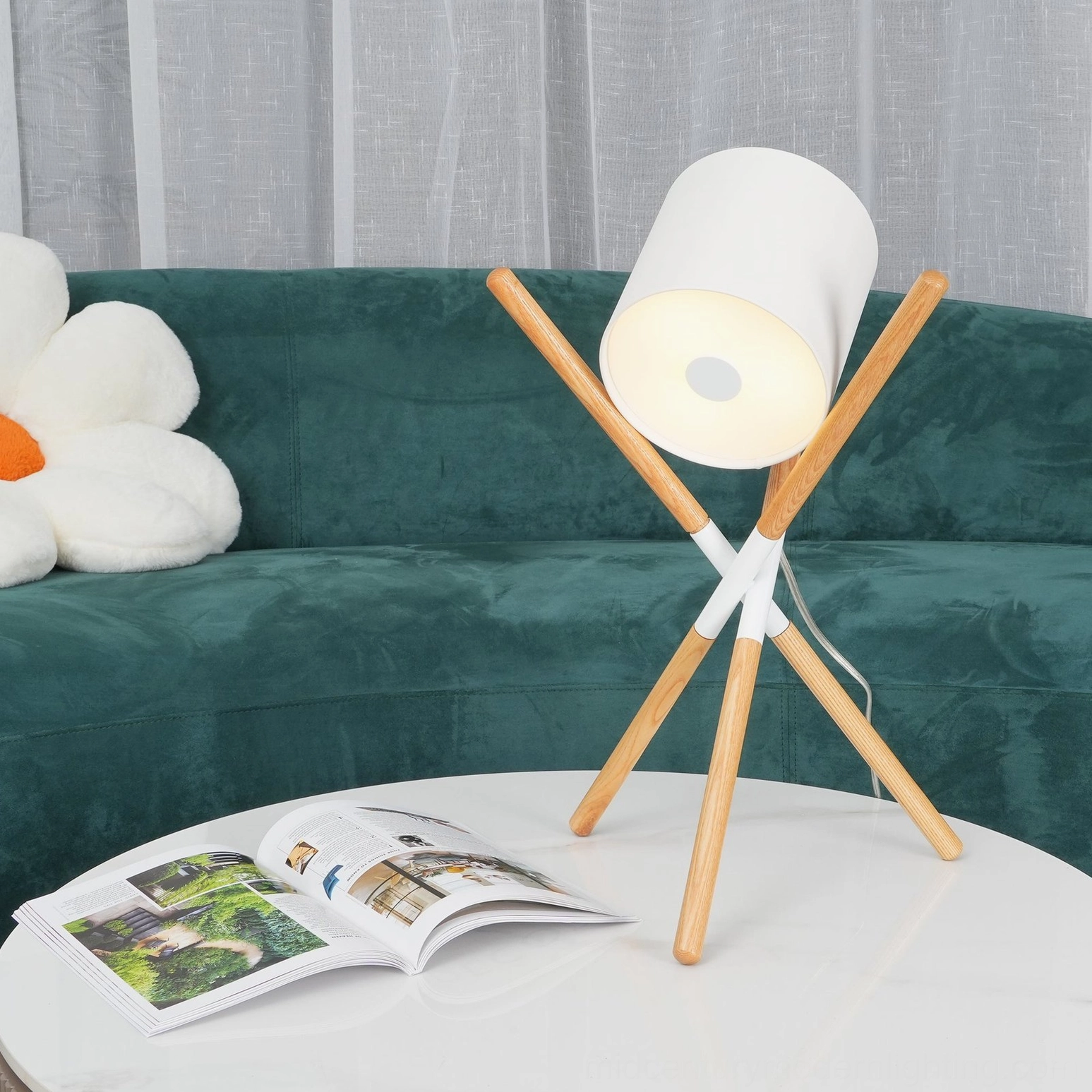 Shift tripod table lamp with elegant proportions and mid-century modern design elements