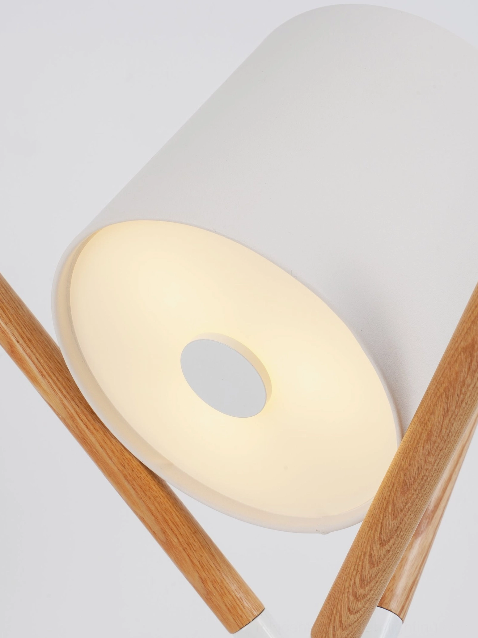 Mid-century modern tripod table lamp with natural wood construction and minimalist design aesthetic