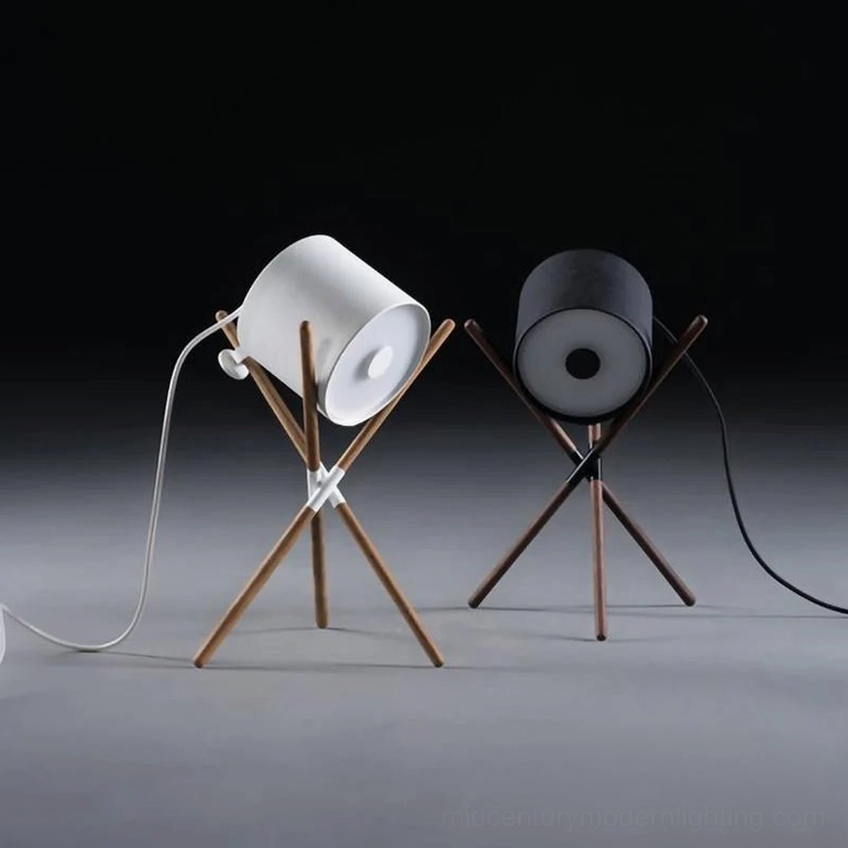 Pair of matching mid-century modern tripod table lamps with white and dark grey shades and natural wood legs